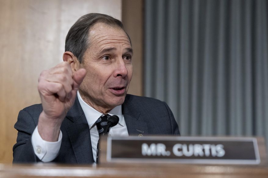 Sen. John Curtis, R-Utah, questions Sen. Marco Rubio, R-Fla., President-elect Donald Trump's choice to be Secretary of State, as he appears before the Senate Foreign Relations Committee for his confirmation hearing, at the Capitol in Washington, Wednesday, Jan. 15, 2025. (AP Photo/Alex Brandon)