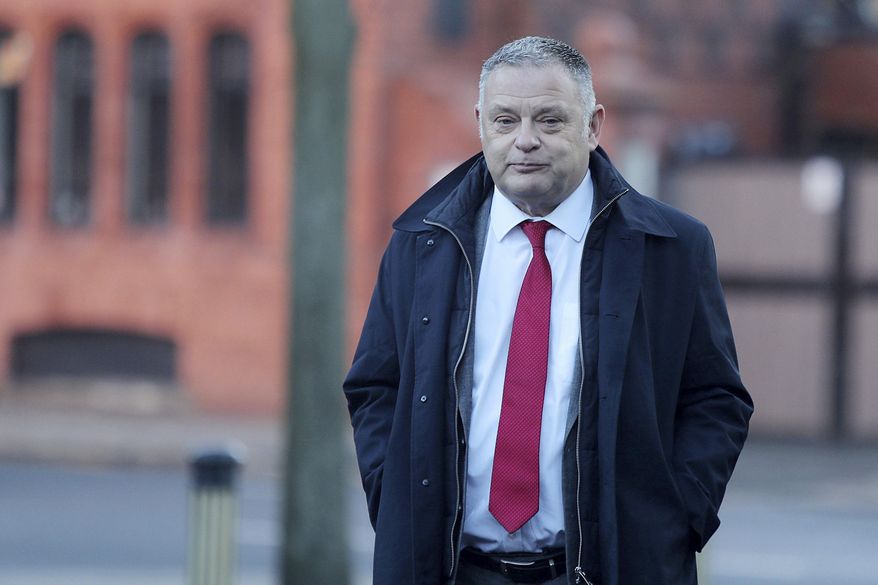 British lawmaker Mike Amesbury arrives at Chester Ellesmere Port and Neston Magistrates' Court, where he is charged with assault, Thursday Jan. 16, 2025. ( Ian Cooper/PA via AP)