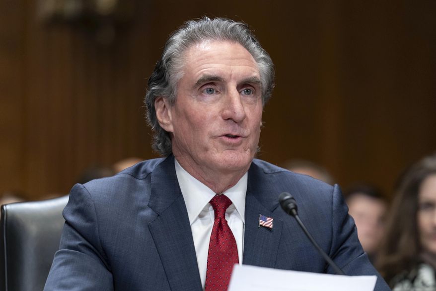 Former Gov. Doug Burgum, President-elect Donald Trump's choice to lead the the Interior Department as Secretary of the Interior, testifies before the Senate Energy and Natural Resources Committee on Capitol Hill in Washington, Thursday, Jan. 16, 2025. (AP Photo/Jose Luis Magana)