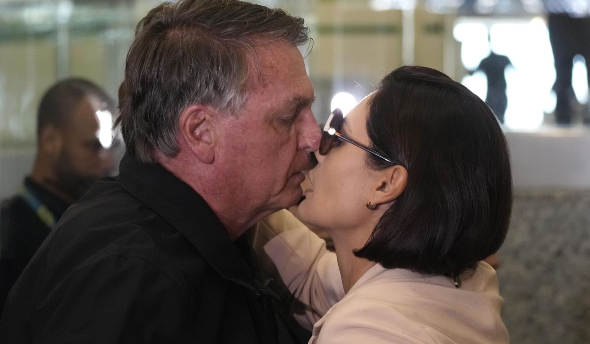 NextImg:Banned from traveling, Brazil’s Bolsonaro sees off his wife heading to Trump’s inauguration