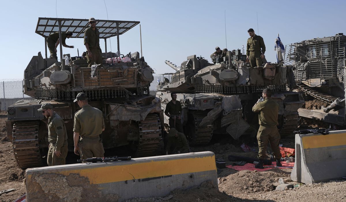NextImg:Qatar says ceasefire between Israel and Hamas will go into effect at 8:30 a.m. on Sunday