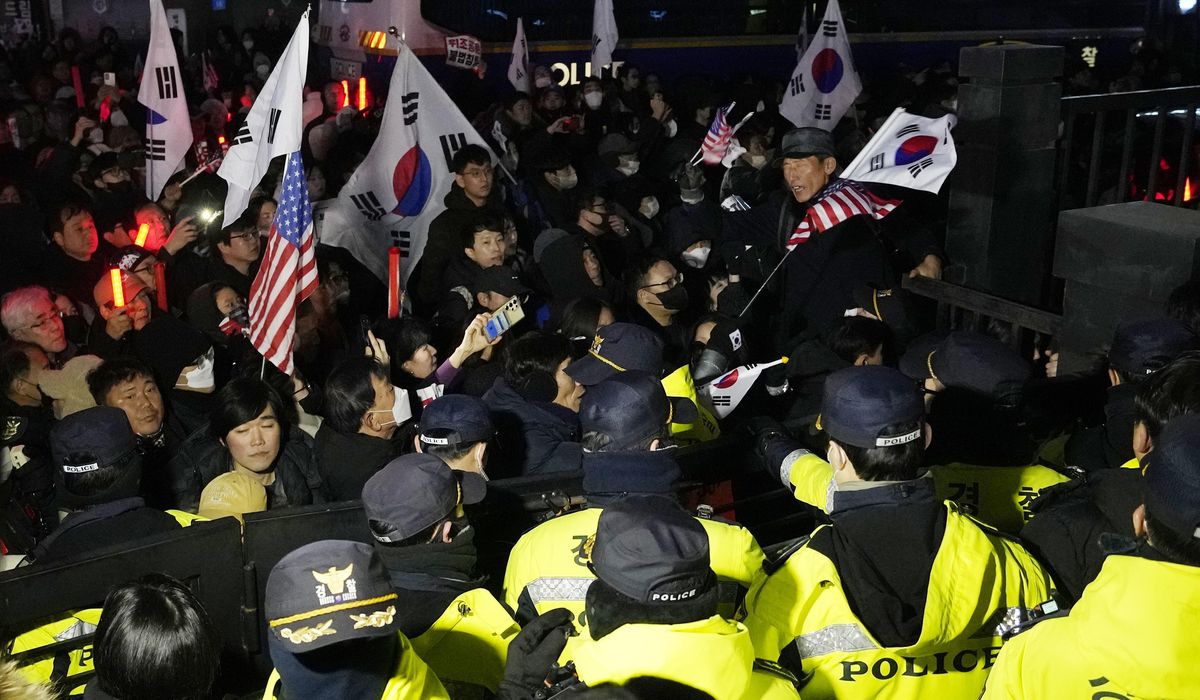 NextImg:South Korean court orders arrest of impeached President Yoon over martial law decree