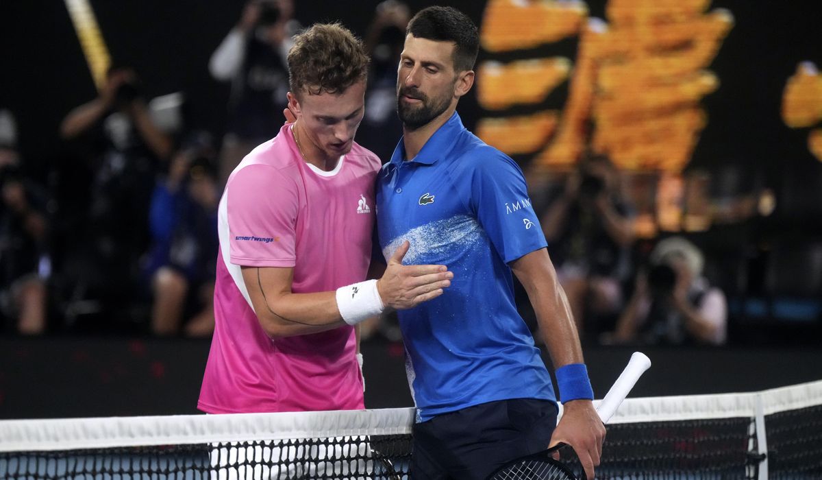 NextImg:Broadcaster apologizes after Djokovic refuses post-match TV interview at Australian Open