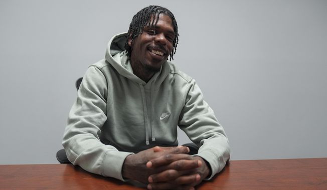Malik Grant poses for a portrait, Tuesday, Jan. 14, 2025, in Baltimore. (AP Photo/Stephanie Scarbrough)