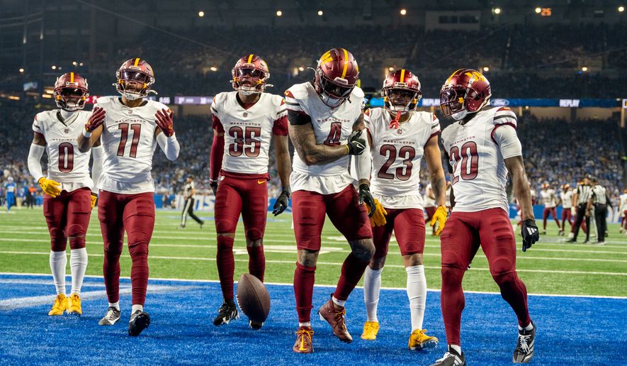 Washington Commanders Line Back Frankie Luvu (4) celebrating with Commanders defense after recovering fumble at Ford Field, Detroit, Michigan, January 18th, 2025. Washington Commanders defeat the Detroit Lions 45-31 in Divisional Playoff game. (Photo by Jordan Sabillo, for the Washington Times)