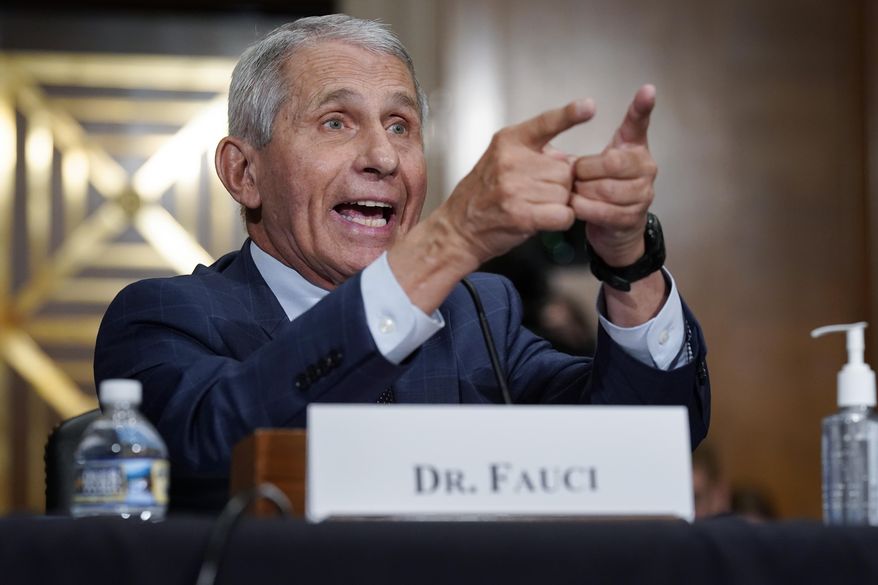 Dr. Anthony Fauci, director of the National Institute of Allergy and Infectious Diseases, responds to accusations by Sen. Rand Paul, R-Ky., as he testifies before the Senate Health, Education, Labor, and Pensions Committee about the origin of COVID-19, on Capitol Hill in Washington, July 20, 2021. (AP Photo/J. Scott Applewhite, Pool) **FILE**