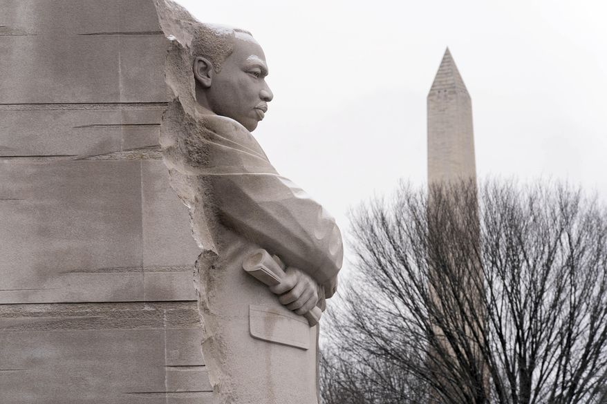 FILE - A view of the Martin Luther King Jr. Memorial, backdropped by the Washington Monument during the annual MLK wreath-laying ceremony in Washington, Jan. 15, 2024. ( AP Photo/Jose Luis Magana, File)