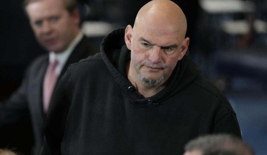 Sen. John Fetterman, D-Pa., arrives before the 60th Presidential Inauguration in the Rotunda of the U.S. Capitol in Washington, Monday, Jan. 20, 2025. (AP Photo/Julia Demaree Nikhinson, Pool)