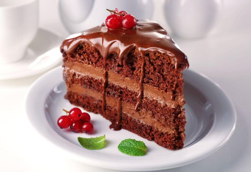 Make every slice unforgettable and indulge in the rich history of chocolate cake this National Chocolate Cake Day. Photo credit: Depositphotos.