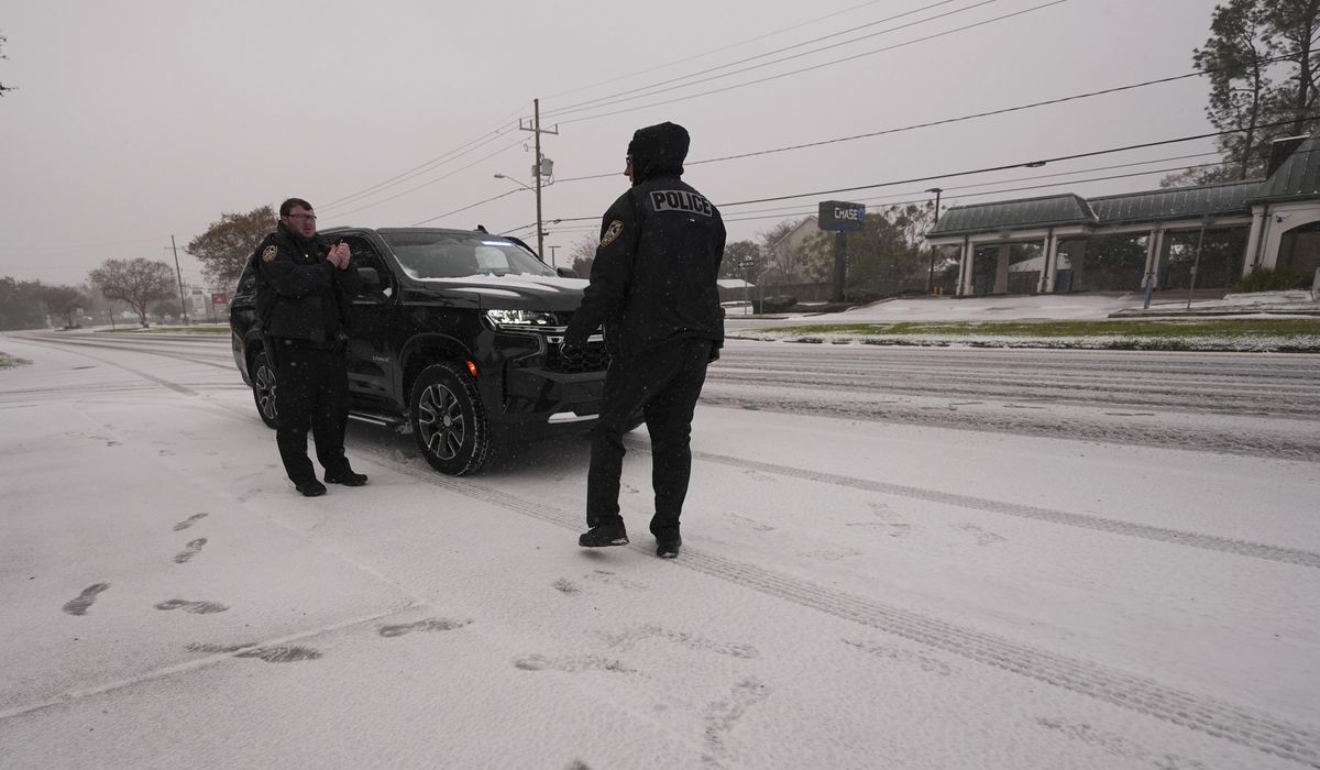 NextImg:A rare winter storm is bringing heavy snow, sleet and ice to Texas and the northern Gulf Coast