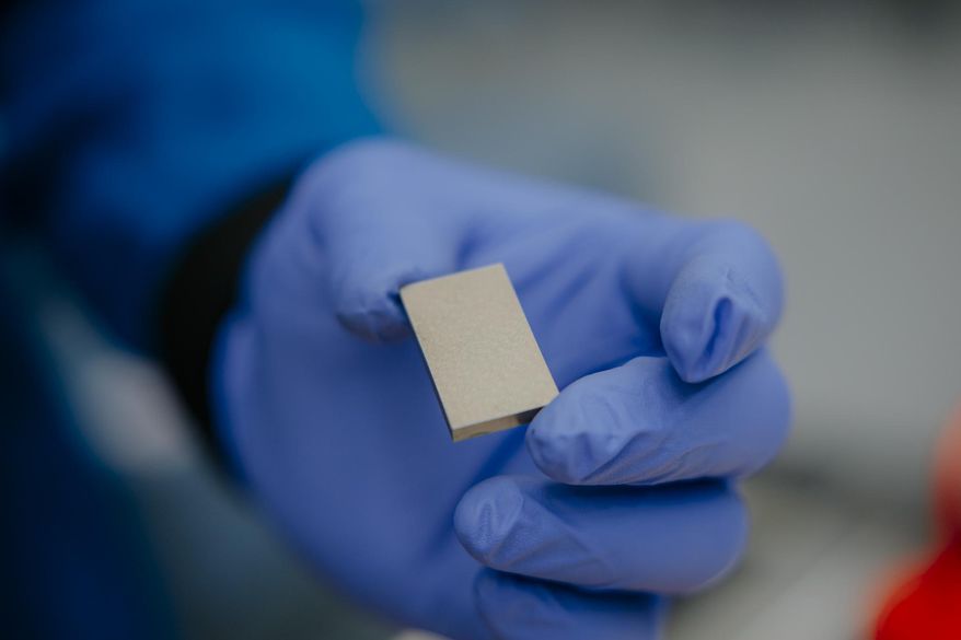 A rare earth magnet being inspected at MP Materials' Independence facility in Fort Worth, Texas. (Photo: Business Wire)