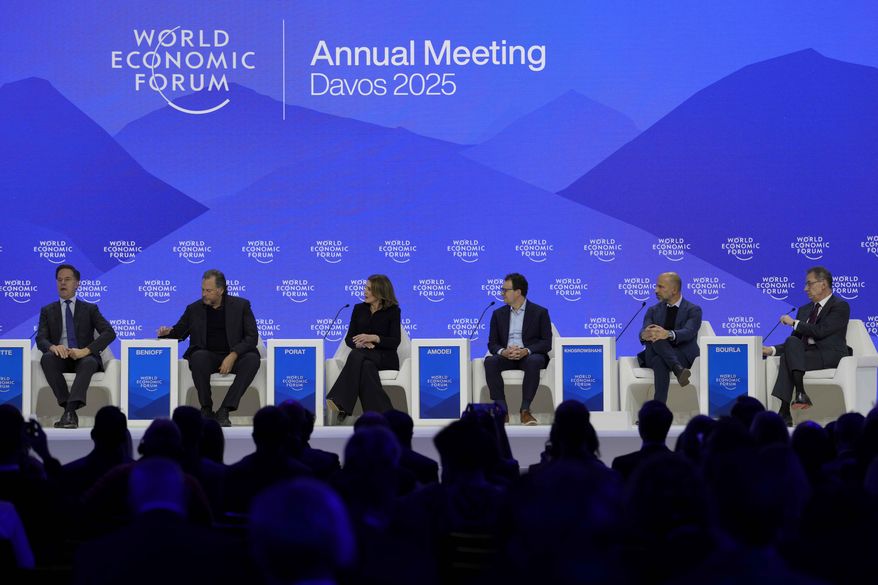 NATO Secretary General Mark Rutte, left, attends a panel discussion at the Annual Meeting of World Economic Forum in Davos, Switzerland, Thursday, Jan. 23, 2025. (AP Photo/Markus Schreiber)