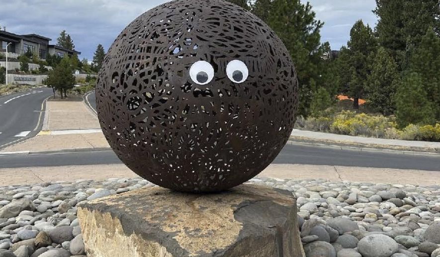 This image provided by the City of Bend, Ore., shows a pair of googly eyes placed on a public art sculpture in Bend. (City of Bend, Oregon, via AP, File)