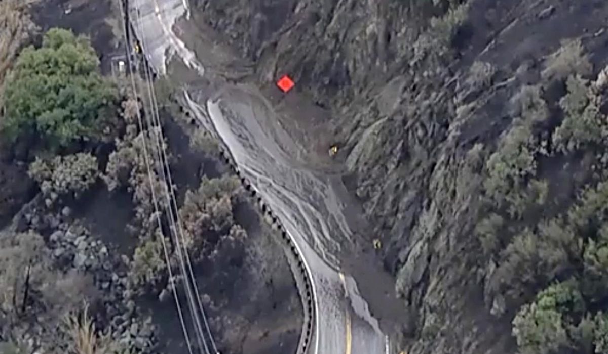NextImg:Rain in Southern California creates mudflows but helps firefighters