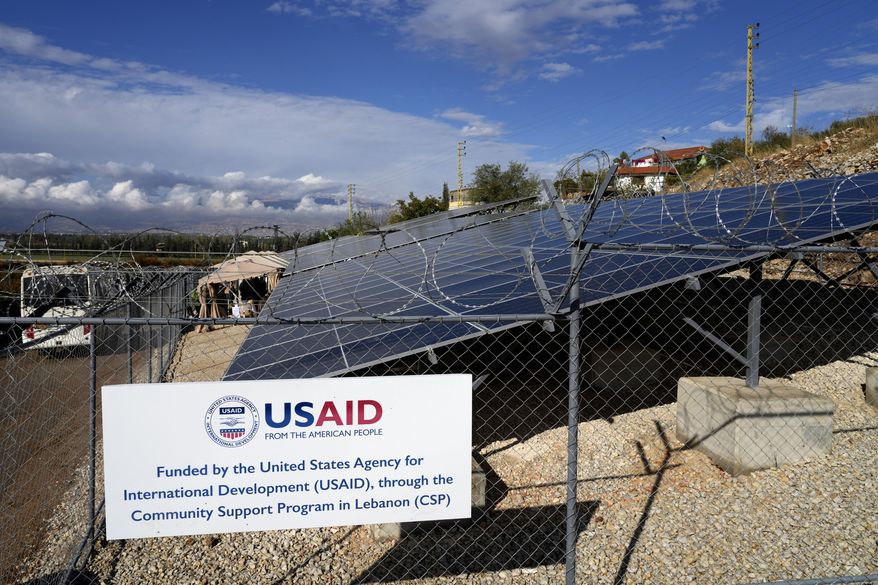 FILE - Solar panels system funded by United States Agency for International Development (USAID) are seen in the Lebanese-Syrian border town of Majdal Anjar, eastern Bekaa valley, Lebanon, Nov. 9, 2022. (AP Photo/Bilal Hussein, File)