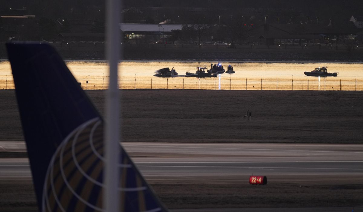 NextImg:No survivors expected after passenger jet collided with Army helicopter near Reagan Airport