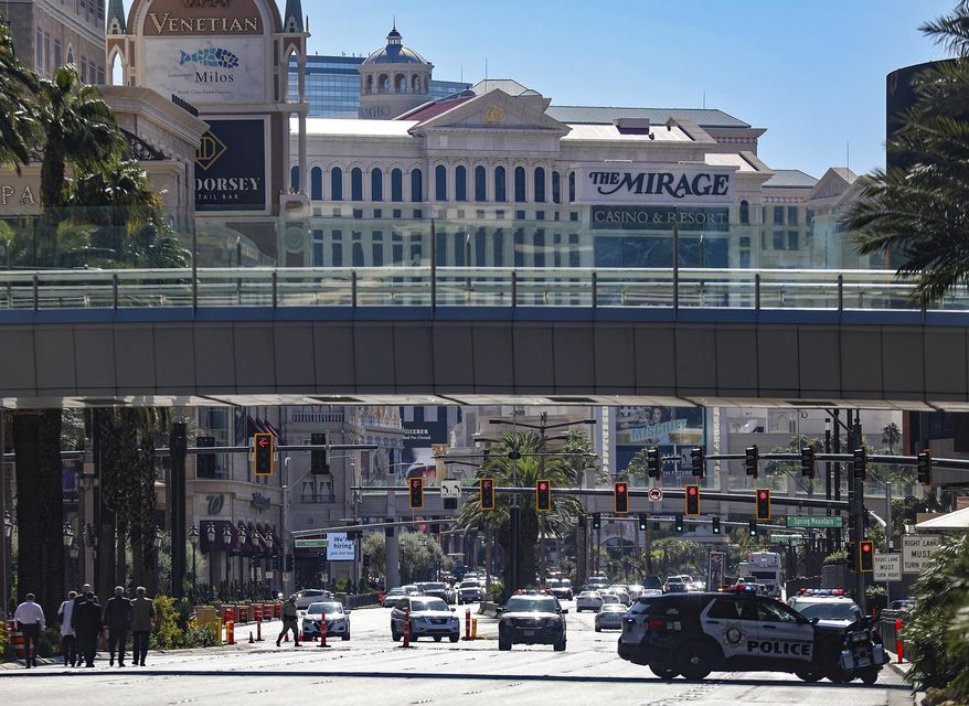 FILE - Police work at the scene where multiple people were stabbed in front of a Strip casino in Las Vegas, Oct. 6, 2022. (Rachel Aston/Las Vegas Review-Journal via AP, File)