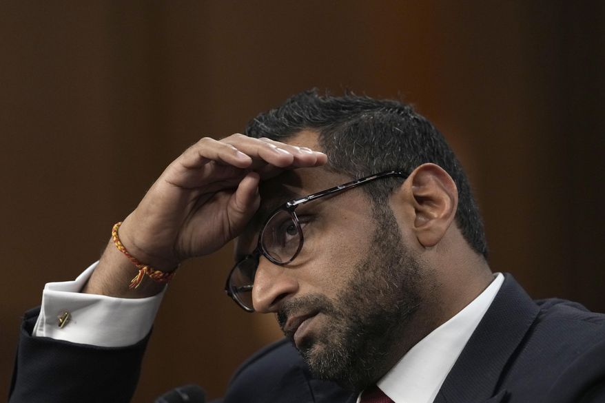 Kash Patel, President Donald Trump's choice to be director of the FBI, appears before the Senate Judiciary Committee for his confirmation hearing, at the Capitol in Washington, Thursday, Jan. 30, 2025. (AP Photo/Ben Curtis)