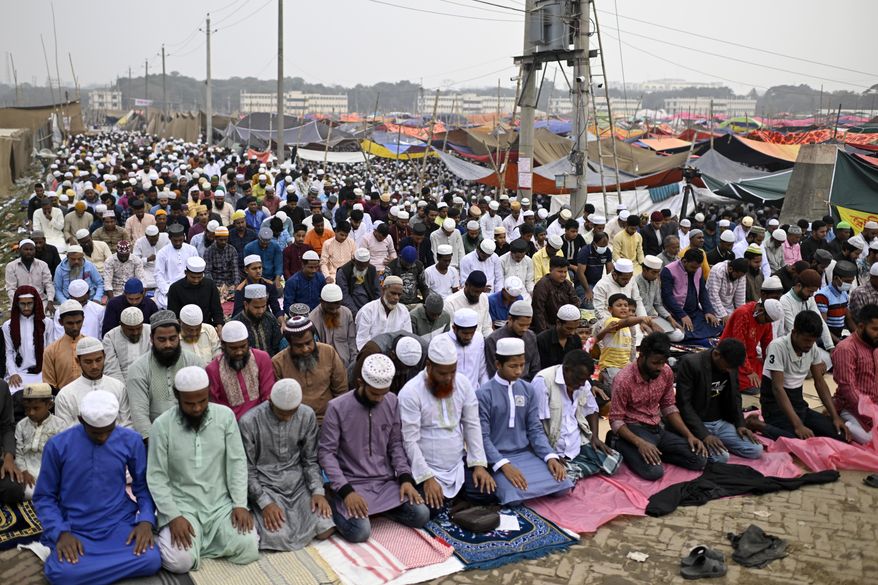 Muslim devotees pray during the first phase of the three-day Biswa Ijtema, or the World Congregation of Muslims, at the banks of the Turag river in Tongi, near Dhaka, Bangladesh, Friday, Jan. 31, 2025. (AP Photo/Mahmud Hossain Opu)