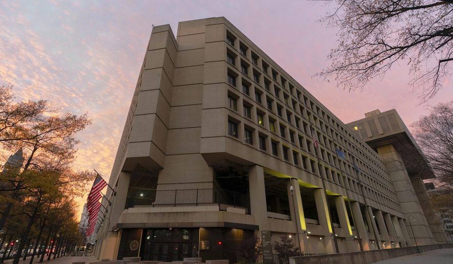 FILE - Federal Bureau of Investigation (FBI) Headquarters is seen in Washington, Saturday, Dec. 7, 2024. (AP Photo/Jose Luis Magana, File)