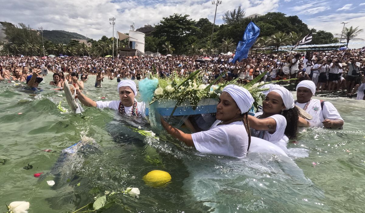 NextImg:Devotees pay homage to Afro-Brazilian sea goddess on Rio de Janeiro beach