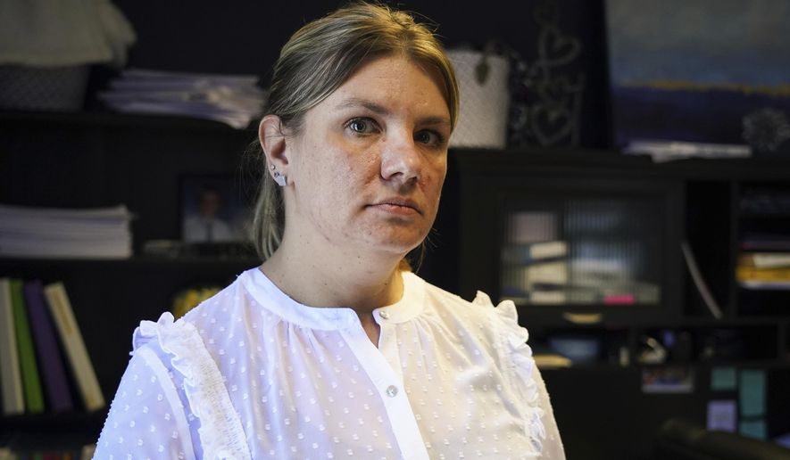 FILE - Aimee Bock, the executive director of the nonprofit Feeding Our Future, speaks Jan. 27, 2022, in St. Anthony, Minn. (Shari L. Gross/Star Tribune via AP, File)