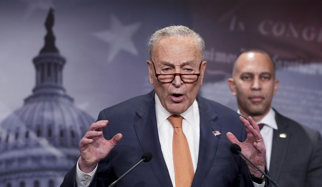 Senate Minority Leader Chuck Schumer, D-N.Y., and House Minority Leader Hakeem Jeffries, D-N.Y., right, express their alarm to reporters about actions by President Donald Trump and his adviser Elon Musk, on Capitol Hill in Washington, Tuesday, Feb. 4, 2025. Democrats fear Musk is wielding power within the federal government without accountability and potentially against the law. (AP Photo/J. Scott Applewhite) ** FILE **