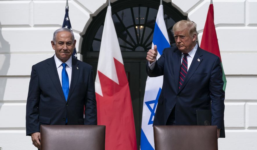 FILE- Israeli Prime Minister Benjamin Netanyahu, left, and President Donald Trump stand as they prepare to depart after the Abraham Accords signing ceremony on the South Lawn of the White House, Sept. 15, 2020, in Washington. (AP Photo/Alex Brandon, File)