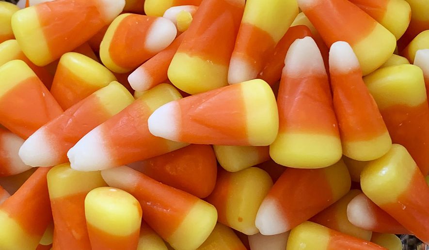 This image shows a pile of candy corn in Westchester County, N.Y., Oct. 23, 2023. (AP Photo/Julia Rubin, File)