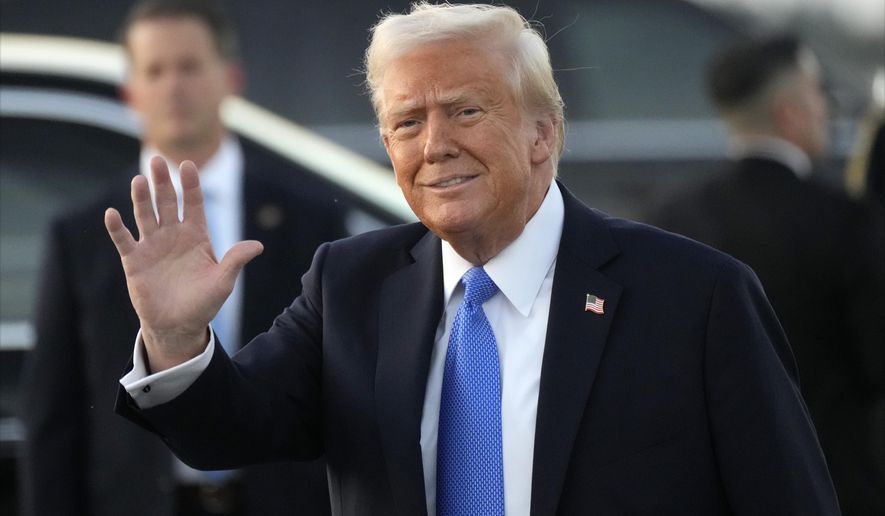 President Donald Trump waves after arriving on Air Force One at Palm Beach International Airport in West Palm Beach, Fla., Friday, Feb. 7, 2025. (AP Photo/Ben Curtis)