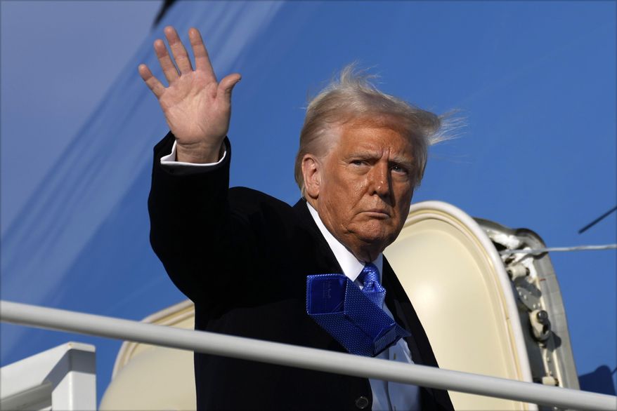 President Donald Trump waves as he boards Air Force One at Joint Base Andrews, Md., Friday, Feb. 7, 2025, en route to his Mar-a-Lago estate in Palm Beach, Fla. (AP Photo/Ben Curtis)