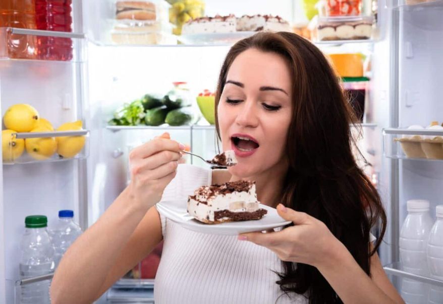 Heartbreak hurts, and food is often our go-to. But can eating your feelings actually help you heal? Here's what to know. Photo credit: Depositphotos.