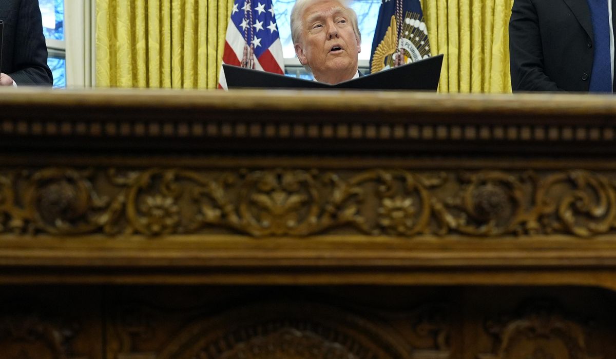 NextImg:Trump pauses enforcement of law banning bribery of foreign officials