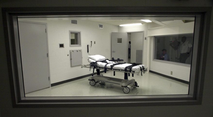 FILE- Alabama's lethal injection chamber is seen Oct. 7, 2002, at Holman Correctional Facility in Atmore, Ala. (AP Photo/Dave Martin, File)