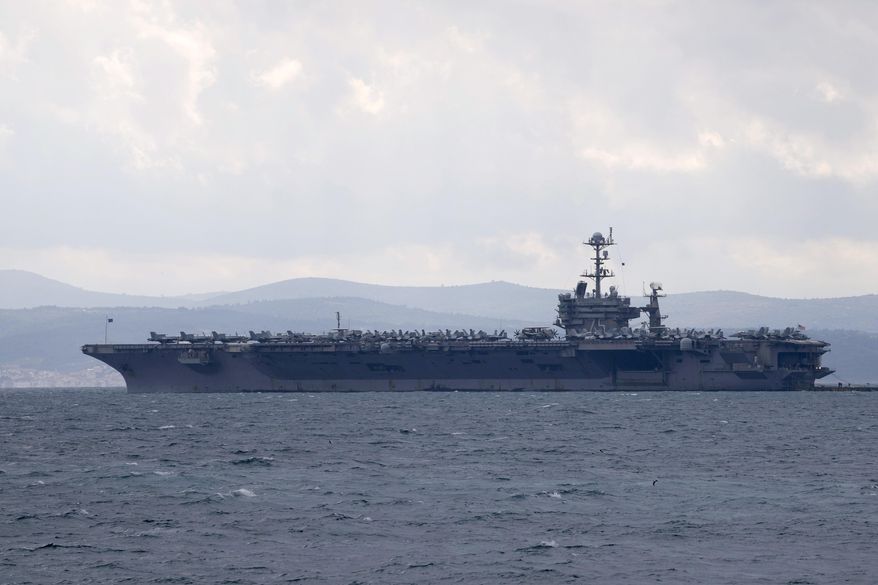 Aircraft carrier USS Harry S. Truman is moored near Split, Croatia, Feb. 14, 2022. (AP Photo/Darko Bandic, File)