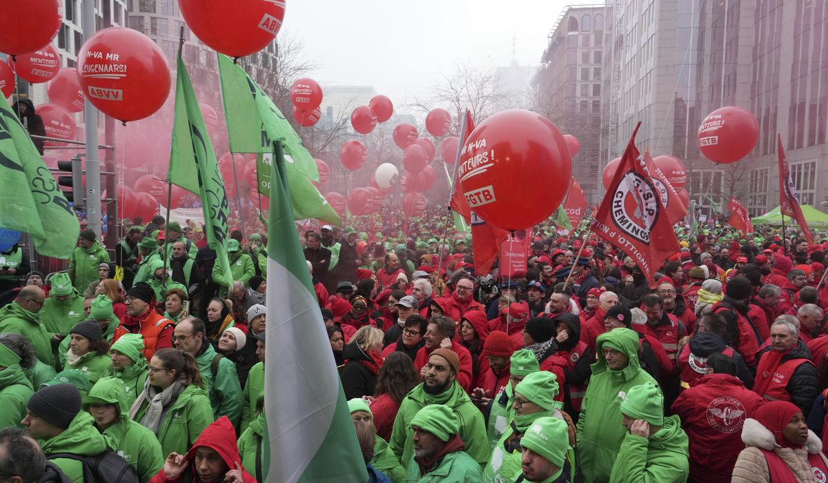 NextImg:Close to 100,000 protest Belgian plans to cut social services in strategy to reduce debt