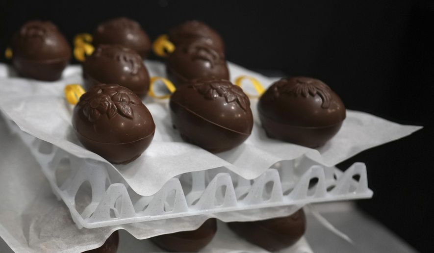 Chocolate eggs dry in the workshop at The Chocolate Line in Bruges, Belgium, Thursday, Feb. 6, 2025. (AP Photo/Virginia Mayo)