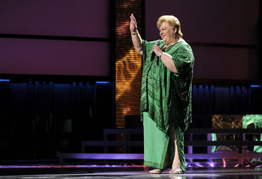FILE - Paquita La Del Barrio performs at the 14th Annual Latin Grammy Awards at the Mandalay Bay Hotel and Casino, Nov. 21, 2013, in Las Vegas. (Photo by Chris Pizzello/Invision/AP), File