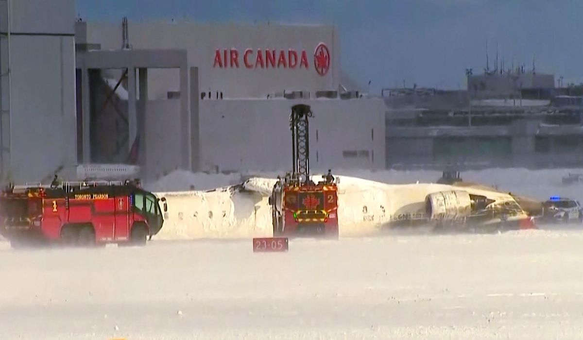 NextImg:Delta Airlines flight flips over on landing at Toronto’s Pearson Airport