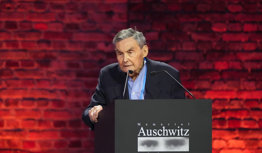 Holocaust survivor Marian Turski addresses guests at the Auschwitz-Birkenau former Nazi German concentration and extermination camp, during a ceremony marking the 80th anniversary of its liberation, in Oswiecim, Poland, Monday, Jan. 27. 2025. (AP Photo/Czarek Sokolowski)