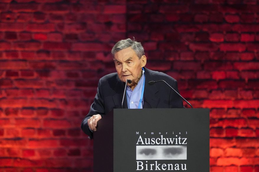 Holocaust survivor Marian Turski addresses guests at the Auschwitz-Birkenau former Nazi German concentration and extermination camp, during a ceremony marking the 80th anniversary of its liberation, in Oswiecim, Poland, Monday, Jan. 27. 2025. (AP Photo/Czarek Sokolowski)