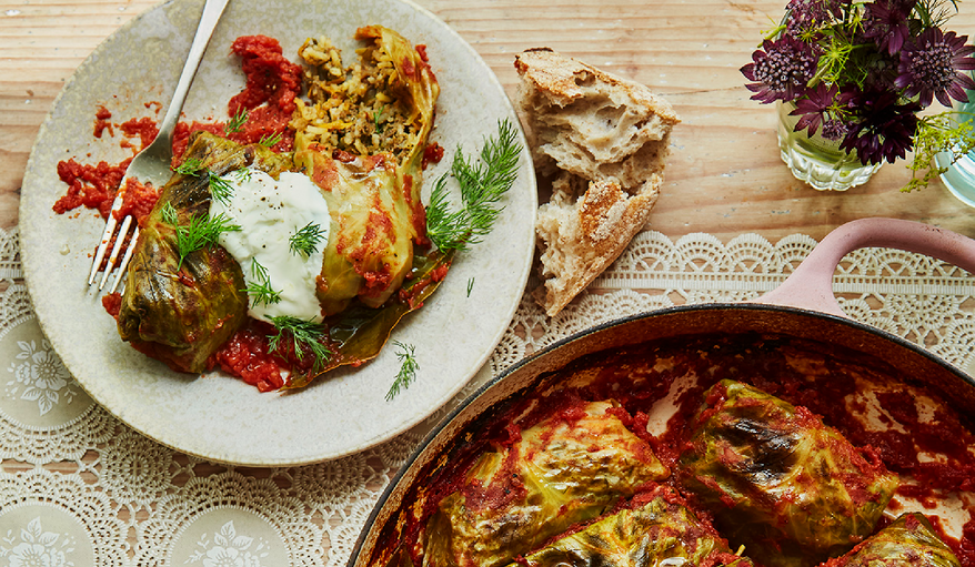 This image released by Quadrille, Penguin Random House UK shows a recipe for cabbage rolls with sauerkraut leaves, beef and rice in a tomato sauce, from the cookbook "Kapusta: Vegetable-Forward Recipes from Eastern Europe" by Alissa Timoshkina. (Laura Edwards via AP)