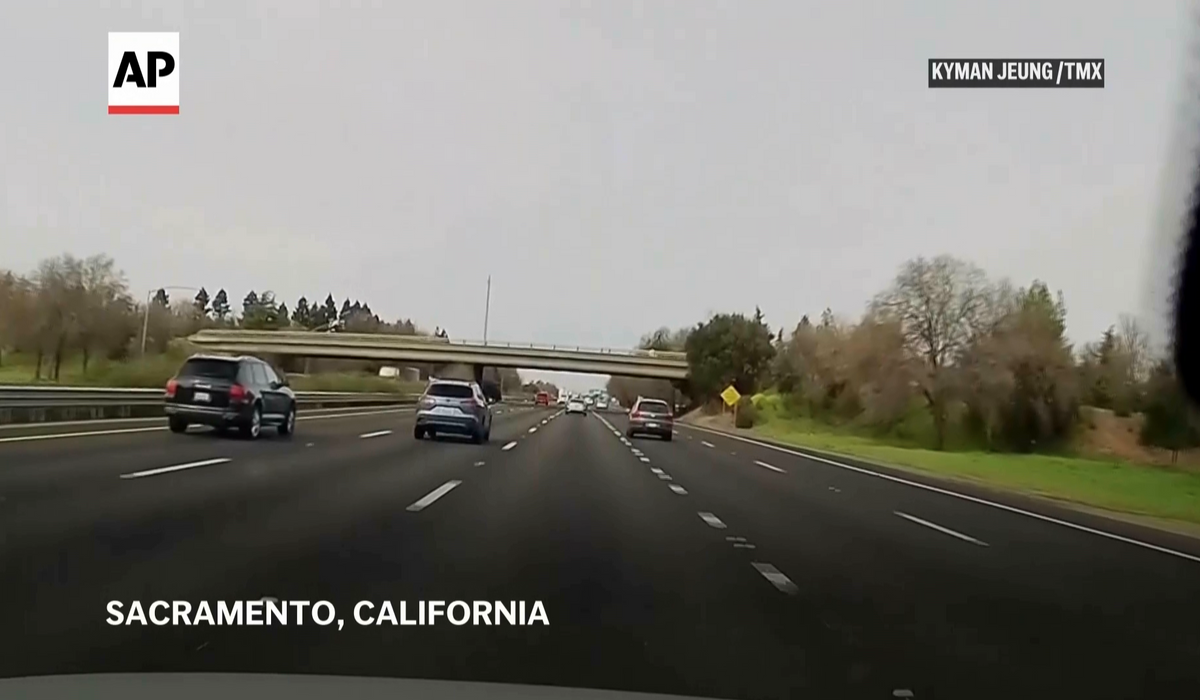 NextImg:WATCH: Car flies off overpass into highway traffic