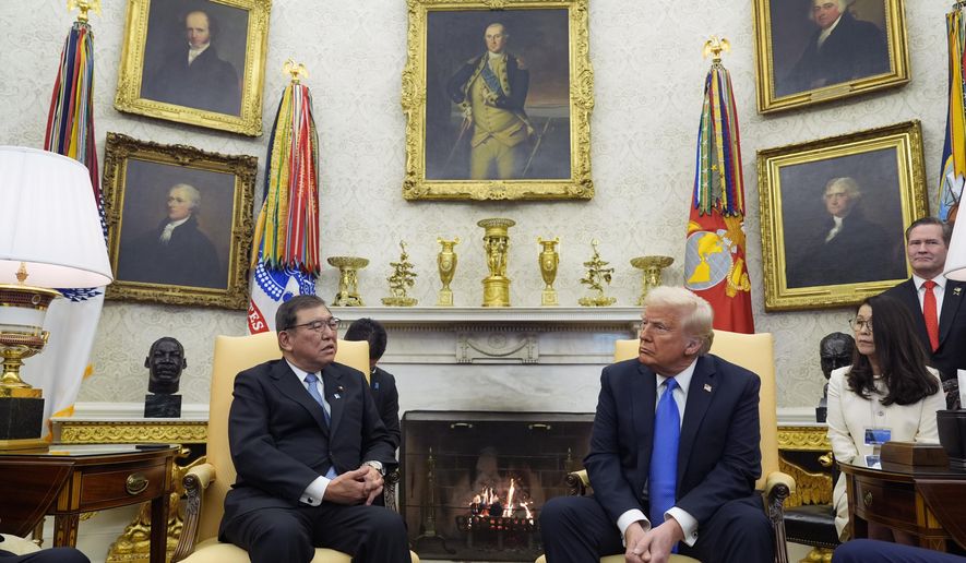President Donald Trump speaks with Japanese Prime Minister Shigeru Ishiba in the Oval Office of the White House, Friday, Feb. 7, 2025, in Washington. (AP Photo/Alex Brandon)
