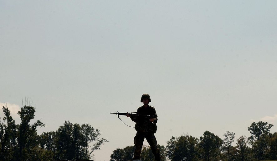 A soldier stands on the firing range at the U.S. Army base in Fort Knox, Kentucky, on Sept. 15, 2004. (AP Photo/Ed Reinke) **FILE**