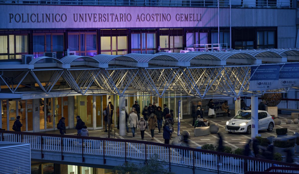 NextImg:Pope is sitting up out of bed at hospital as he recovers from pneumonia