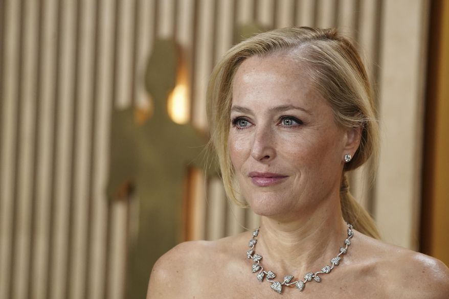 Gillian Anderson arrives at the 31st annual Screen Actors Guild Awards on Sunday, Feb. 23, 2025, at the Shrine Auditorium in Los Angeles. (Photo by Jordan Strauss/Invision/AP)
