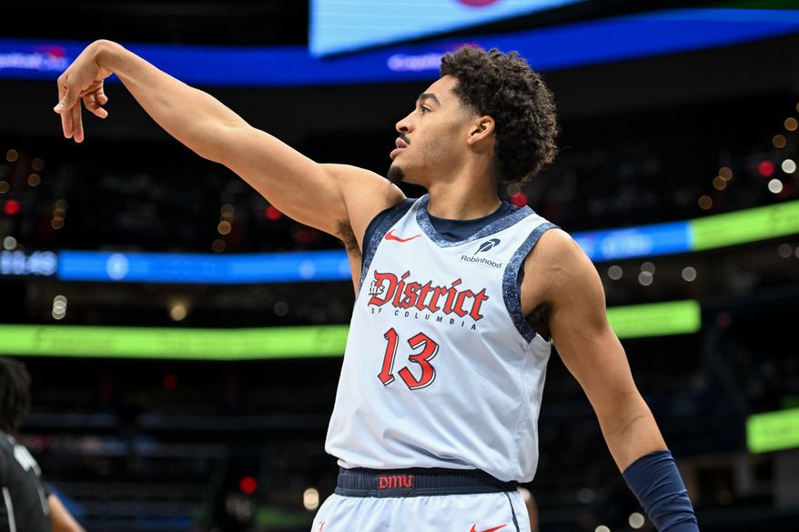 Washington Wizards guard Jordan Poole (13) following through on a shot during the first quarter of an NBA game against the Brooklyn Nets at Capital One Arena in Washington D.C., February 24, 2025. (Photo for the Washington Times)