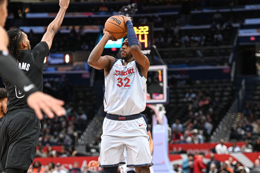 Washington Wizards forward Khris Middleton (32) taking a shot during the first quarter of an NBA game against the Brooklyn Nets at Capital One Arena in Washington D.C., February 24, 2025. (Photo for the Washington Times)