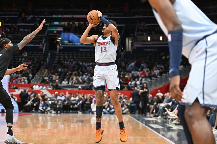 Washington Wizards guard Jordan Poole (13) taking a three during the first quarter of an NBA game against the Brooklyn Nets at Capital One Arena in Washington D.C., February 24, 2025. (Photo for the Washington Times)
